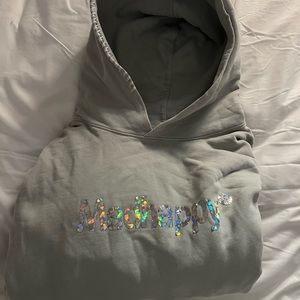 Madhappy sweatshirt. Small tear in pocket.